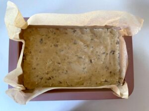 Cherry crumble base made of cinnamon and walnut shortbread