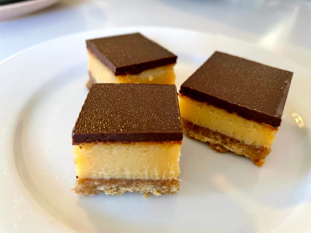 Chocolate caramel slice cut into squares