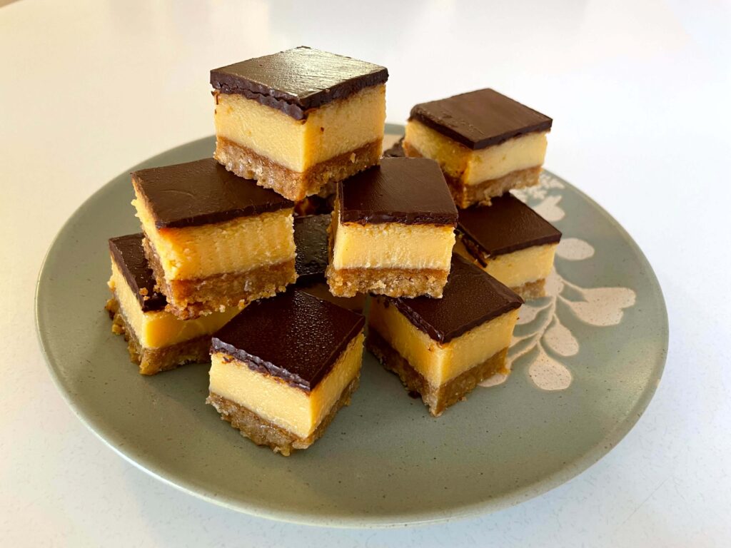 Chocolate caramel slice cut into squares