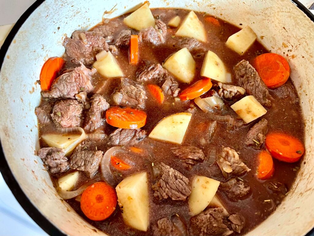 Beef Stew Ingredients in a Dutch Oven Ready to be Slow Cooked