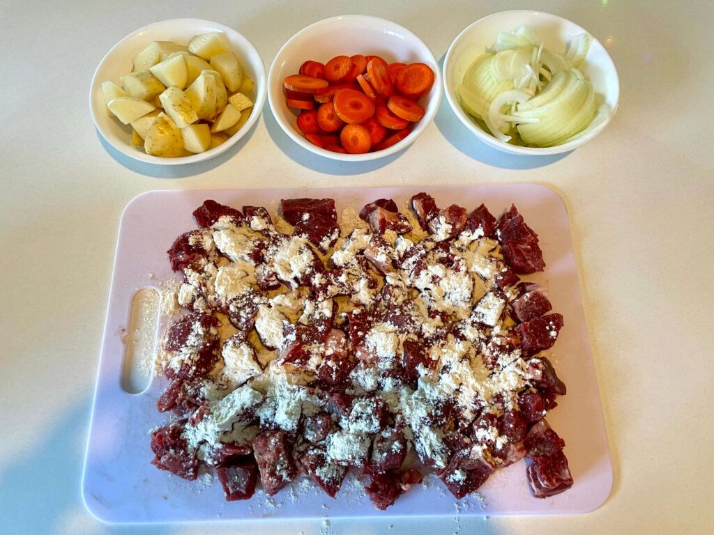 Sliced Vegetables and Cubed Chuck Steak with Flour, Salt, and Pepper