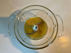 Tahini and lemon juice in a food processor