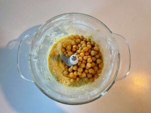 Chickpeas added to the tahini mixture