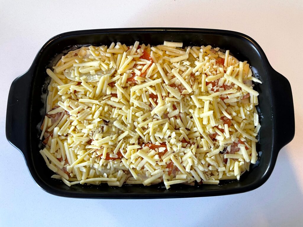 Assembled Potato Bake with Grated Cheese on Top