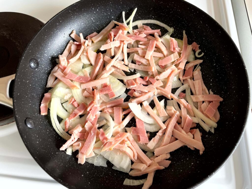 Bacon and Onion in a Frying Pan